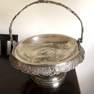 ANTIQUE SILVER PLATE FOOTED BASKET HANDLE